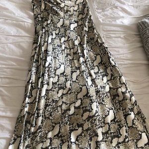 Worn once, snakeskin print satin skirt from H&M. Size 6.
